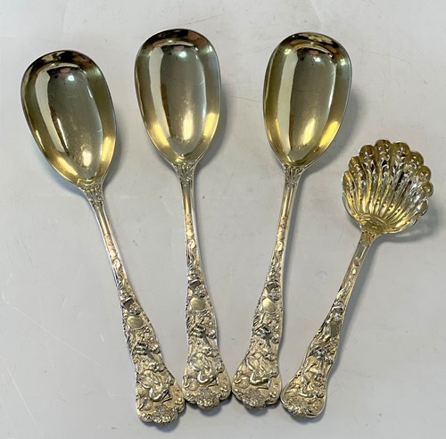 Lot 371 - A four-piece set of Victorian silver gilt serving flatware