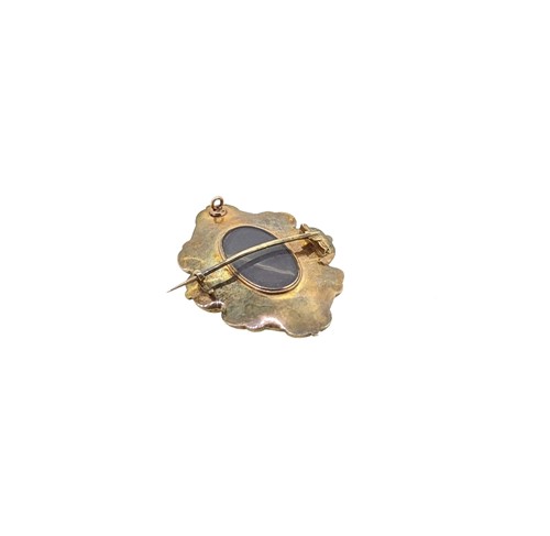 Lot 64 - An enamel, split pearl and diamond memorial brooch