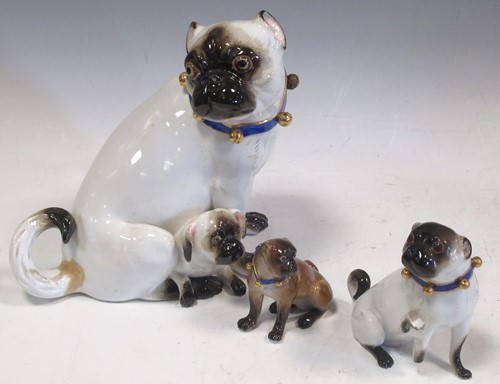Lot 46 - A large Meissen model of a pug dog and puppy,...
