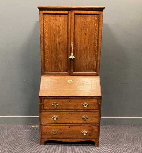 Lot 375 - An oak bureau cabinet, 19th century, 181 x 81...