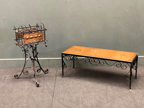 Lot 496 - Iron work Arts and Crafts Magazine rack...