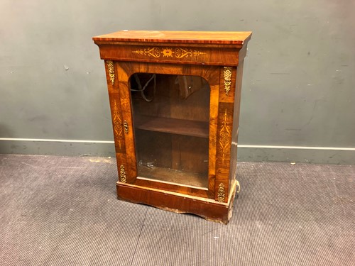 Lot 327 - A Victorian walnut pier cabinet with glazed...