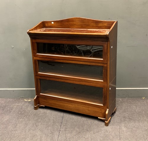 Lot 348 - A mahogany 3 tier glazed stacking bookcase,...