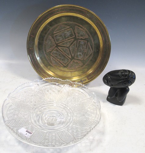 Lot 1 - A middle eastern brass platter embellished...