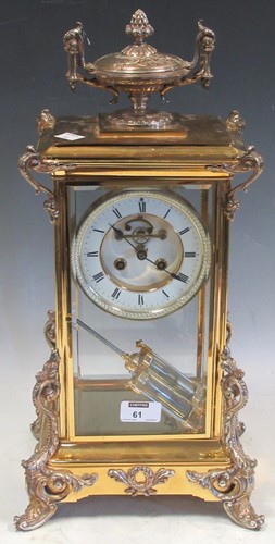 Lot 61 - A 20th-century silver-plated four-glass mantel...