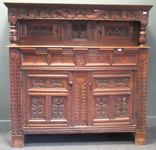 Lot 387 - An early 18th century oak court cupboard,...