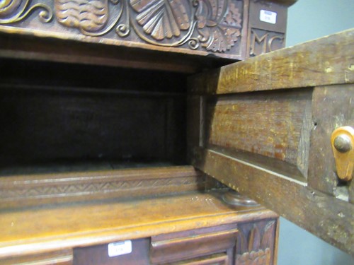 Lot 387 - An early 18th century oak court cupboard,...