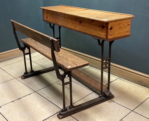 Lot 410 - A late Victorian cast iron and pine school...