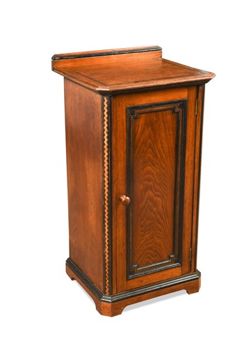 Lot 772 - An Aesthetic movement oak pot cupboard by Lamb of Manchester