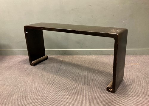 Lot 511 - A hard wood lacquered long altar table with...