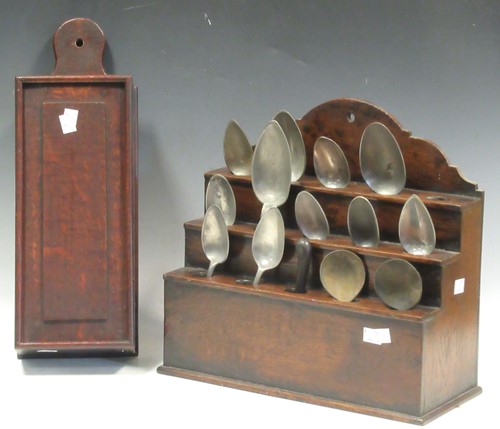 Lot 68 - A 19th century oak spoon rack with various...