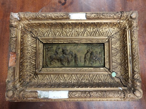 Lot 199 - A plaster relief of men on horseback, together...
