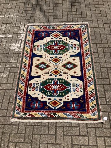Lot 559 - A kazak style rug, 192 x 130cm