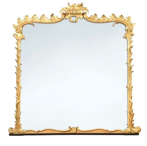 Lot 548 - A large rococo style carved giltwood overmantel mirror, 19th century