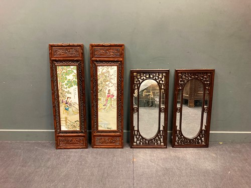 Lot 529 - A pair of Chinese hardwood and ceramic screens...