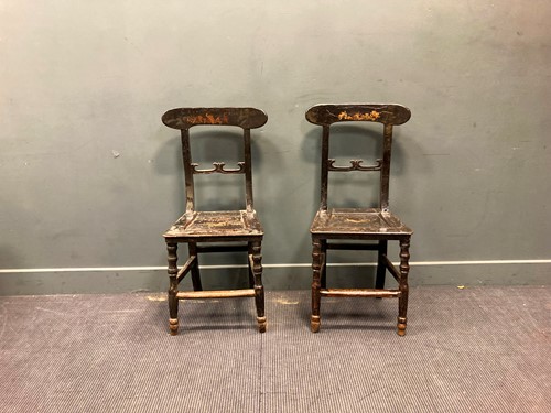 Lot 513 - A pair of black lacquered side chairs painted...