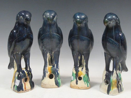 Lot 6 - Four earthenware blue glazed birds, approx...