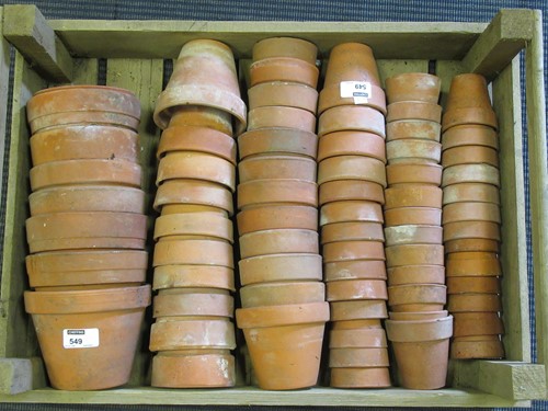 Lot 549 - A quantity of terracotta plant pots, sizes...