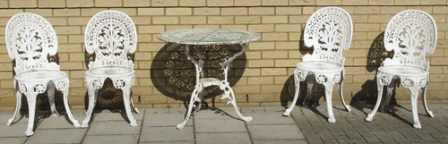 Lot 442 - A white-painted cast metal garden set of...