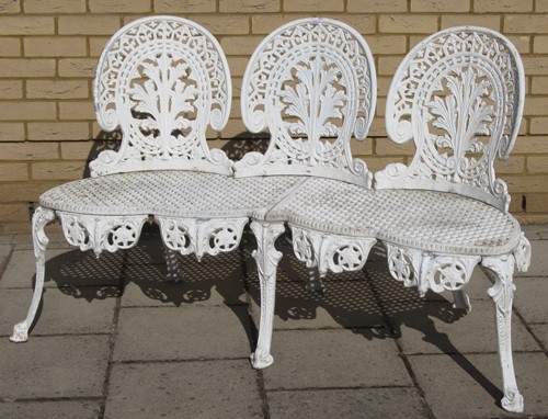 Lot 443 - A white painted cats metal three-seater garden...