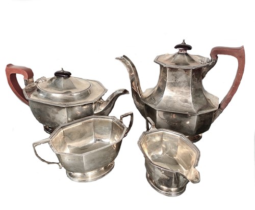 Lot 564 - A George VI silver 3-piece tea set with one later addition