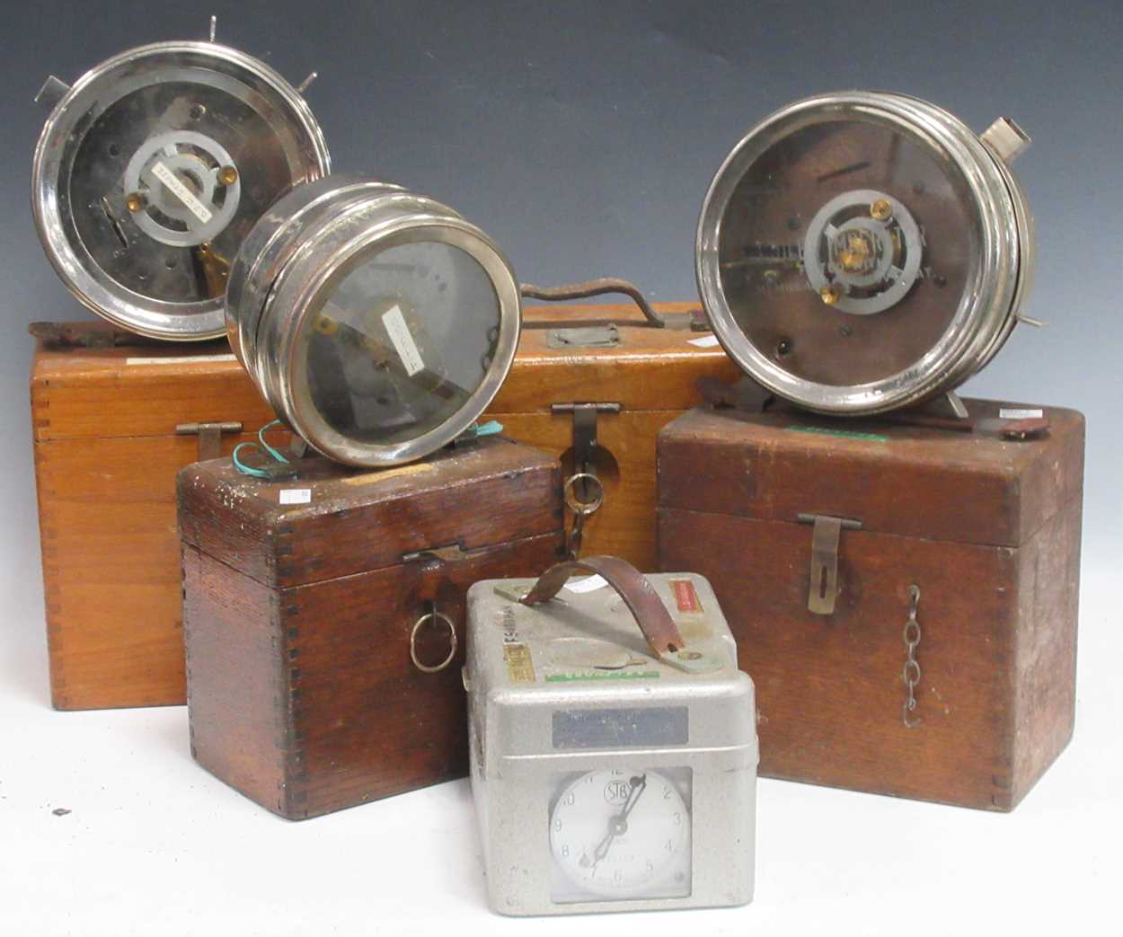 Lot 99 - A collection of racing pigeon clocks, various...