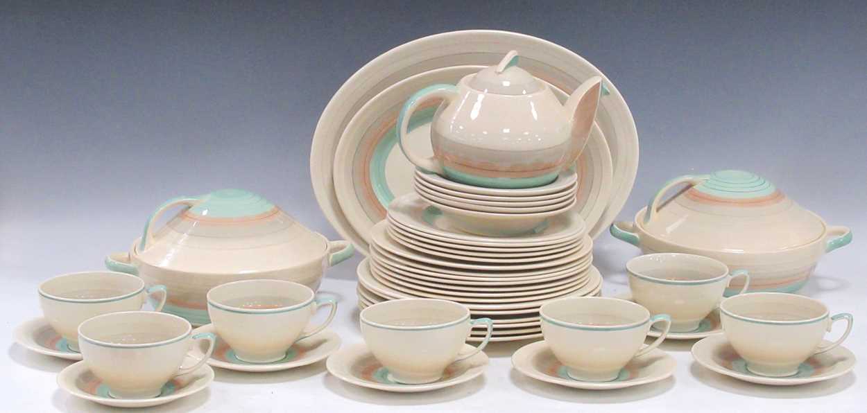 Lot 19 - A Susie Cooper part dinner and tea service,...