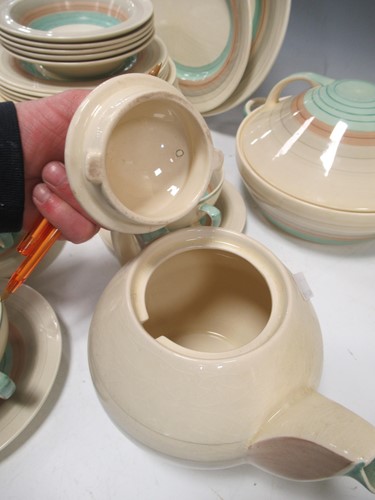 Lot 19 - A Susie Cooper part dinner and tea service,...