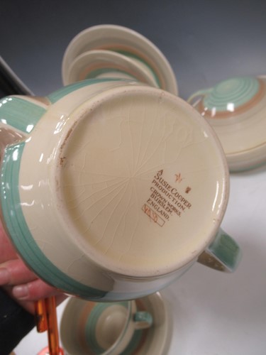 Lot 19 - A Susie Cooper part dinner and tea service,...