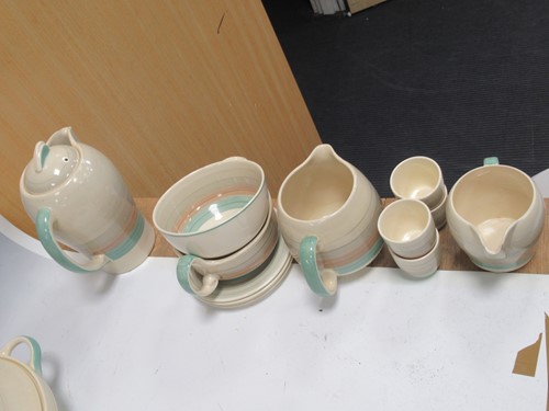 Lot 19 - A Susie Cooper part dinner and tea service,...