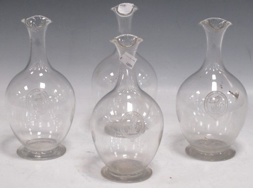 Lot 6 - Four glass decanters with the coat of arms of...