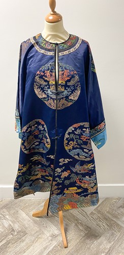 Lot 75 - A Chinese blue silk jacket, 20th century