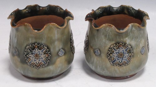 Lot 7 - A pair of Royal Doulton stoneware miniature...