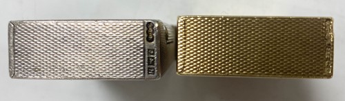 Lot 108 - A 9ct gold pocket lighter by A D Bach and another silver example