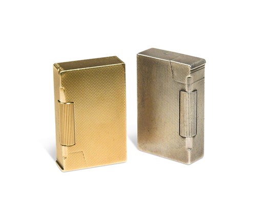 Lot 108 - A 9ct gold pocket lighter by A D Bach and another silver example