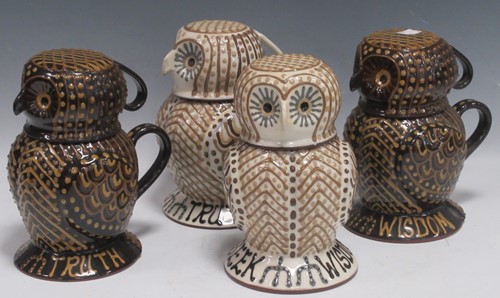 Lot 5 - Four Alsagar Pottery slipware lidded owl jugs,...