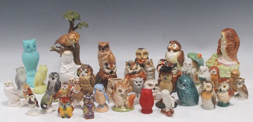 Lot 23 - A collection of Goebel pottery character owls,...