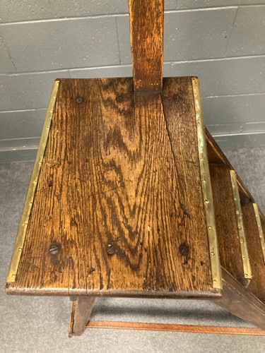 Lot 666 - A set of oak and brass library steps by Drew Clark & Co, early 20th century