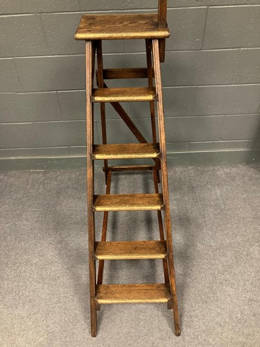 Lot 666 - A set of oak and brass library steps by Drew Clark & Co, early 20th century