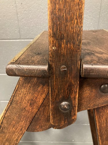 Lot 666 - A set of oak and brass library steps by Drew Clark & Co, early 20th century