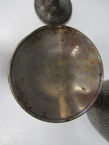 Lot 14 - A pair of Indian Mughal-style inlaid metal...