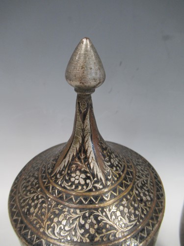 Lot 14 - A pair of Indian Mughal-style inlaid metal...