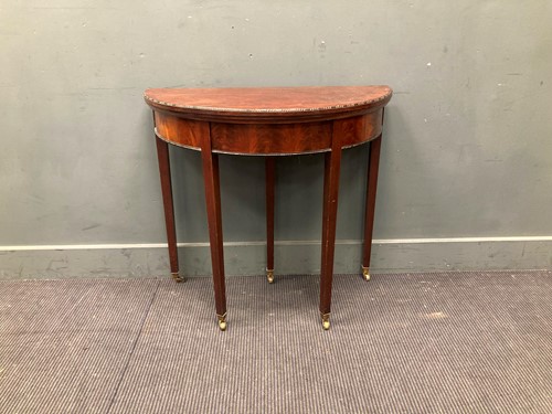 Lot 513 - A mahogany demi-lune fold over card table 76 x...