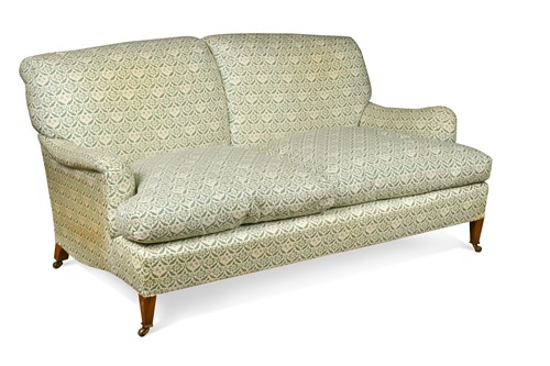 Lot 511 - A 'Howard & Son' two seater sofa by Lenygon & Morant, late 20th century