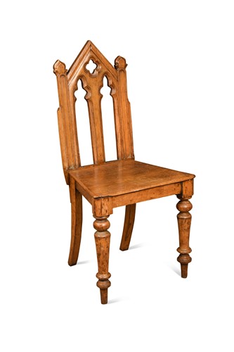Lot 660 - A Gothic style oak hall chair, 19th century