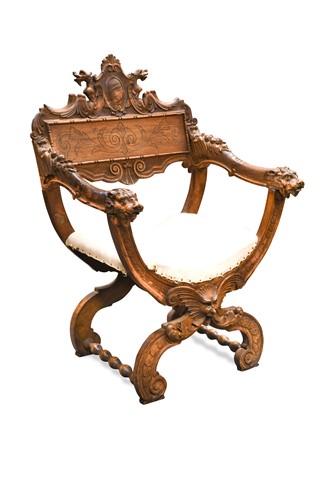 Lot 364 - A Victorian Renaissance style savonarola type armchair, by James Shoolbred & Co