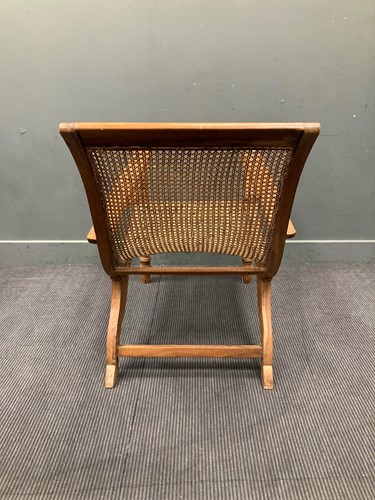 Lot 333 - A teak plantation chair, early 20th century,...