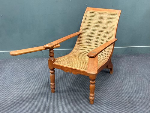 Lot 333 - A teak plantation chair, early 20th century,...