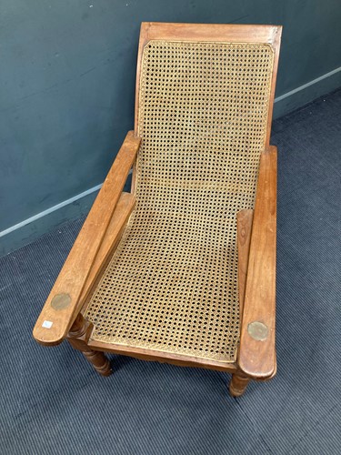 Lot 333 - A teak plantation chair, early 20th century,...