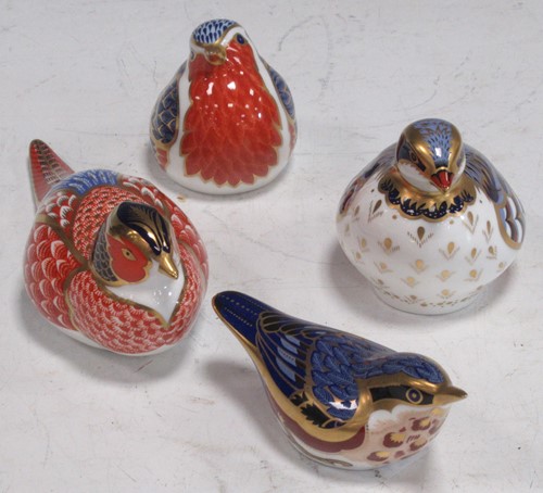 Lot 38 - Four Royal Crown Derby paperweights, to...